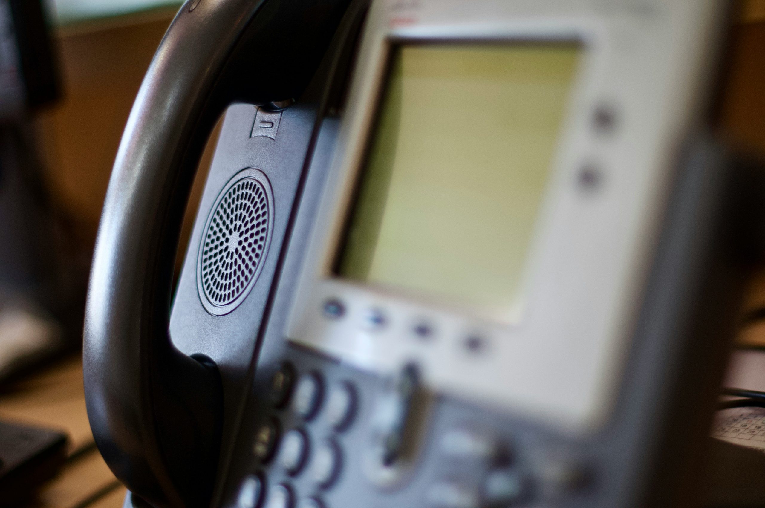 Close-up of an office business phone system on a desk